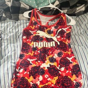 Size is a small it is gently worn. It has two slits on the sides.